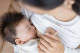 Baby breastfeeding or chestfeeding